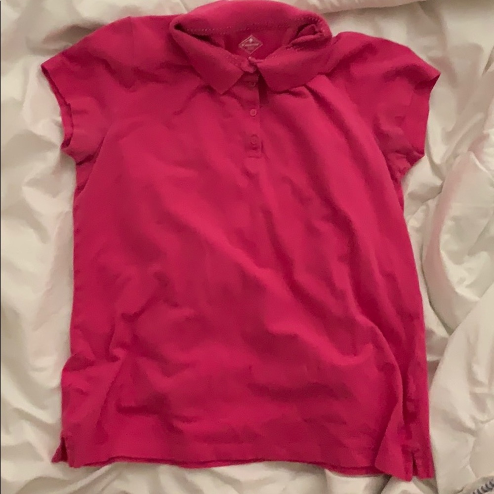 This is a women’s polo shirt